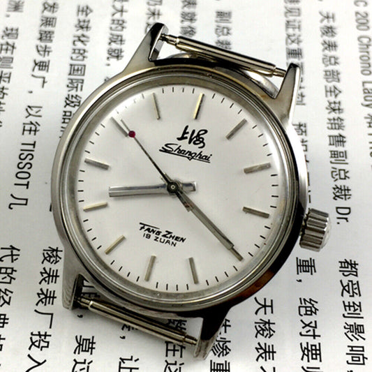 Silver 32mm Shanghai Factory manual mechanical watch with silver case and nail markers, classic design