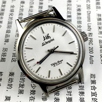 Silver 32mm Shanghai Factory manual mechanical watch with silver case, nail markers, and classic style for elegant wear.