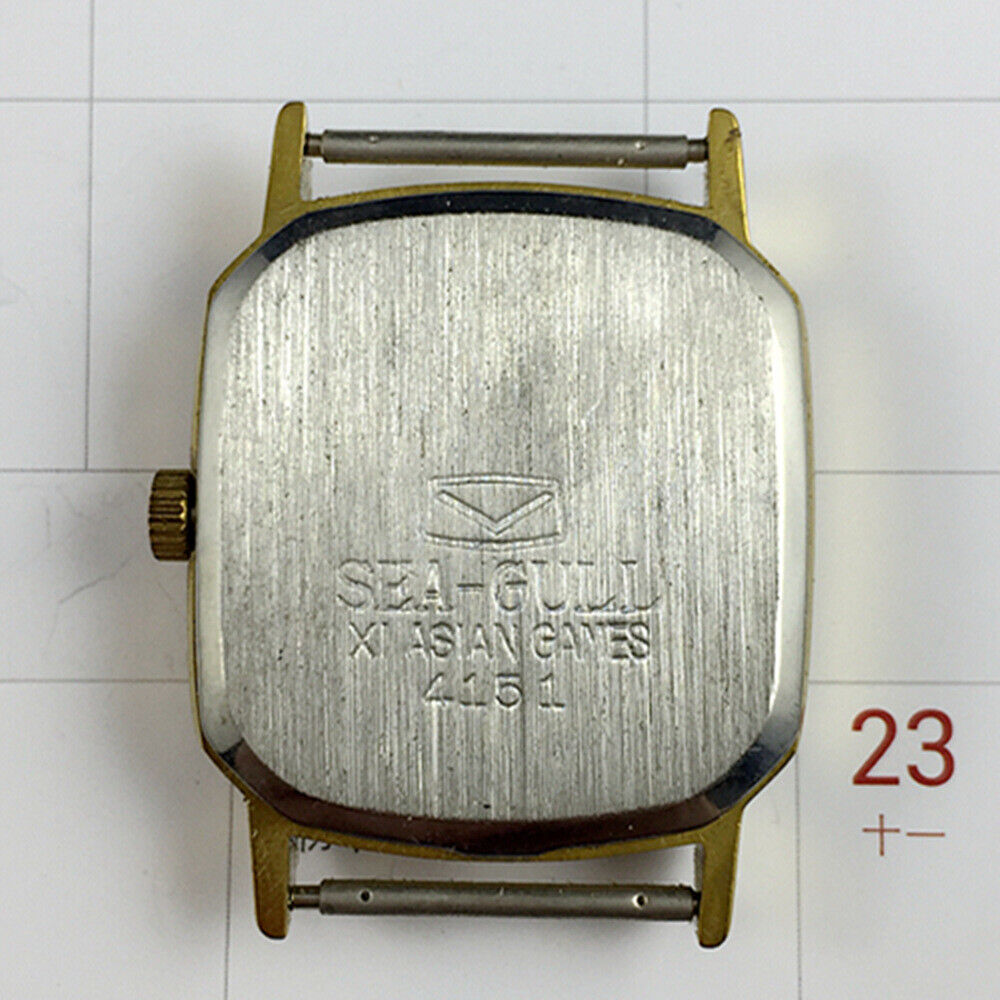 28mm Tianjin Seagull watch with golden octagonal case, manual movement, and elegant gold dial for stylish wear.