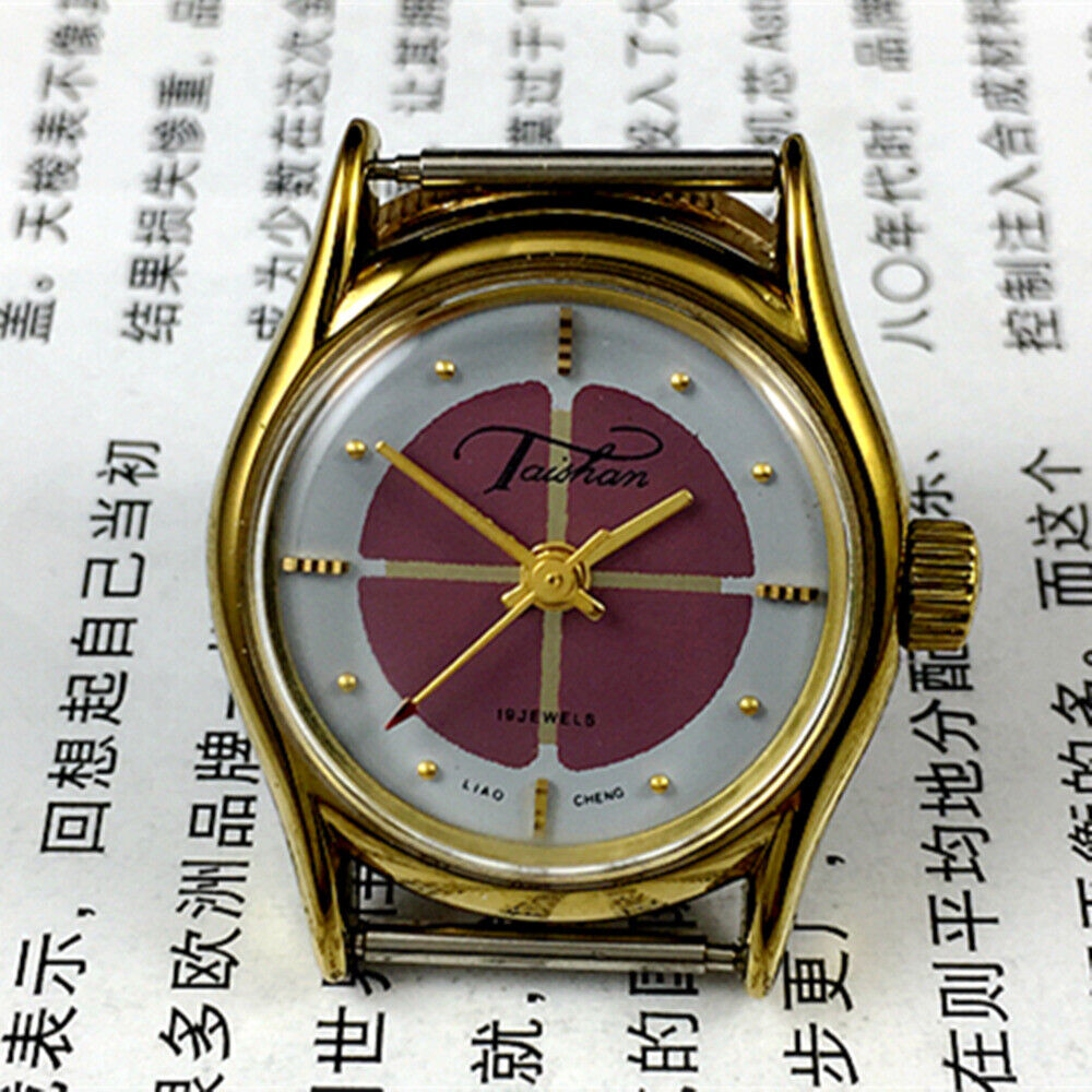 26mm Liaocheng TAISHAN gold-tone manual mechanical lady watch with 19 jewels and elegant design.