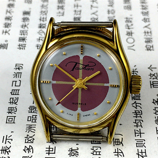 26mm Liaocheng TAISHAN gold-tone manual mechanical lady watch with 19 jewels and elegant design.