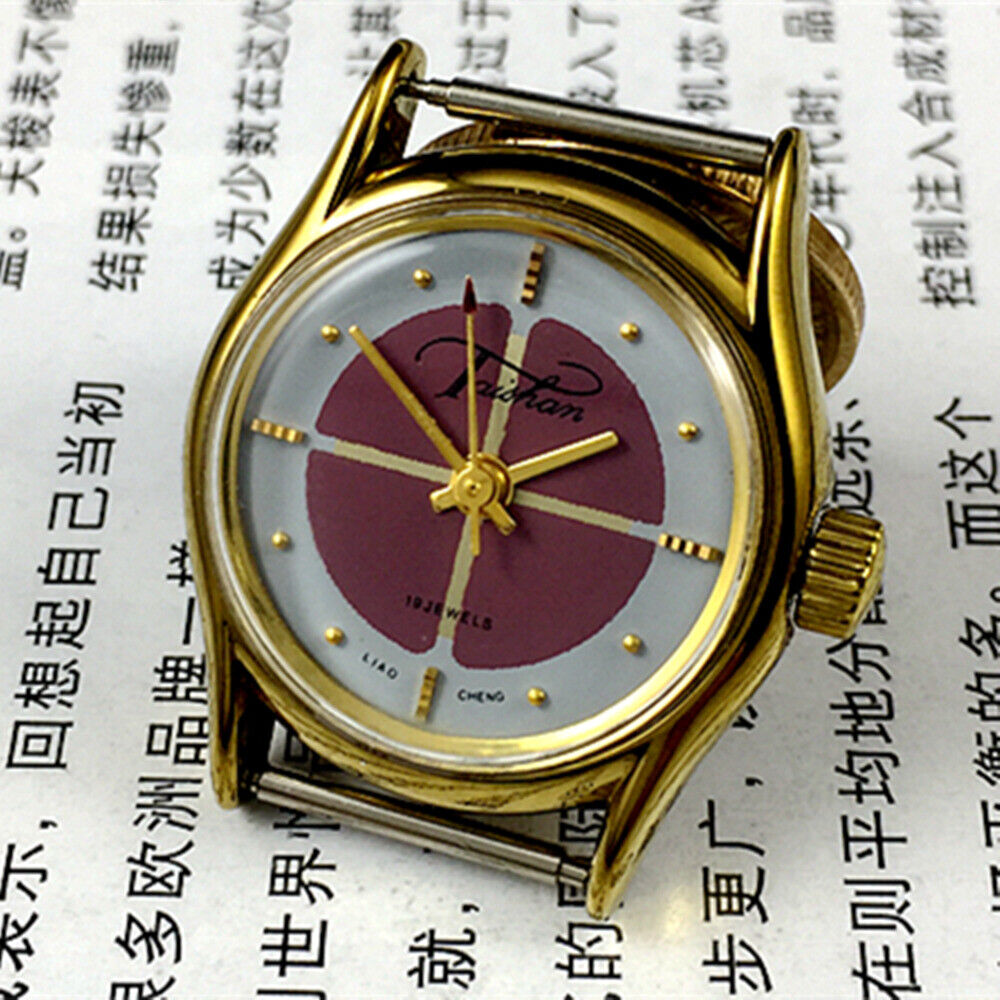 Liaocheng TAISHAN 26mm gold-tone manual watch for women with 19 jewels and elegant design.
