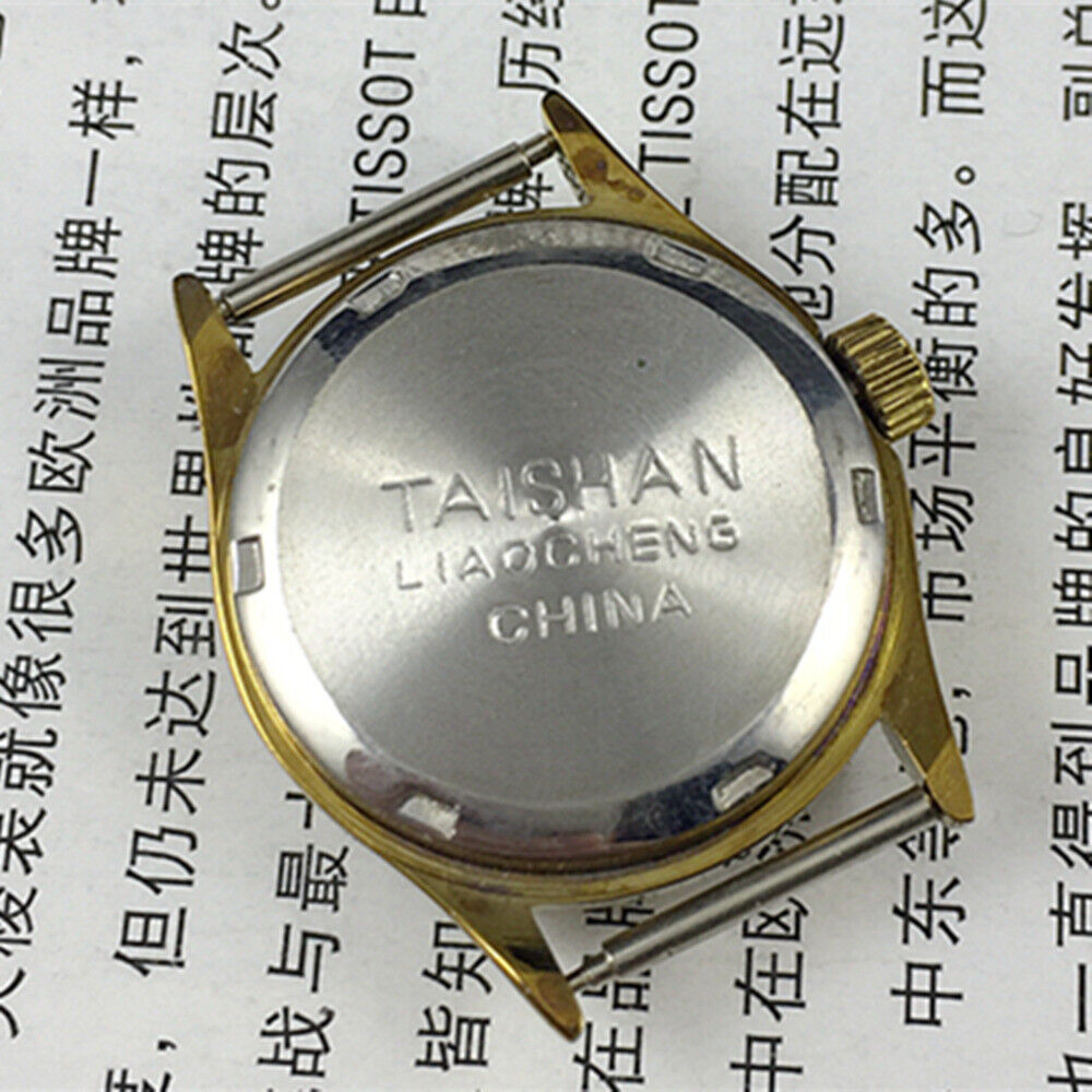 26mm Liaocheng TAISHAN gold-tone manual mechanical lady watch with 19 jewels, elegant and classic style.