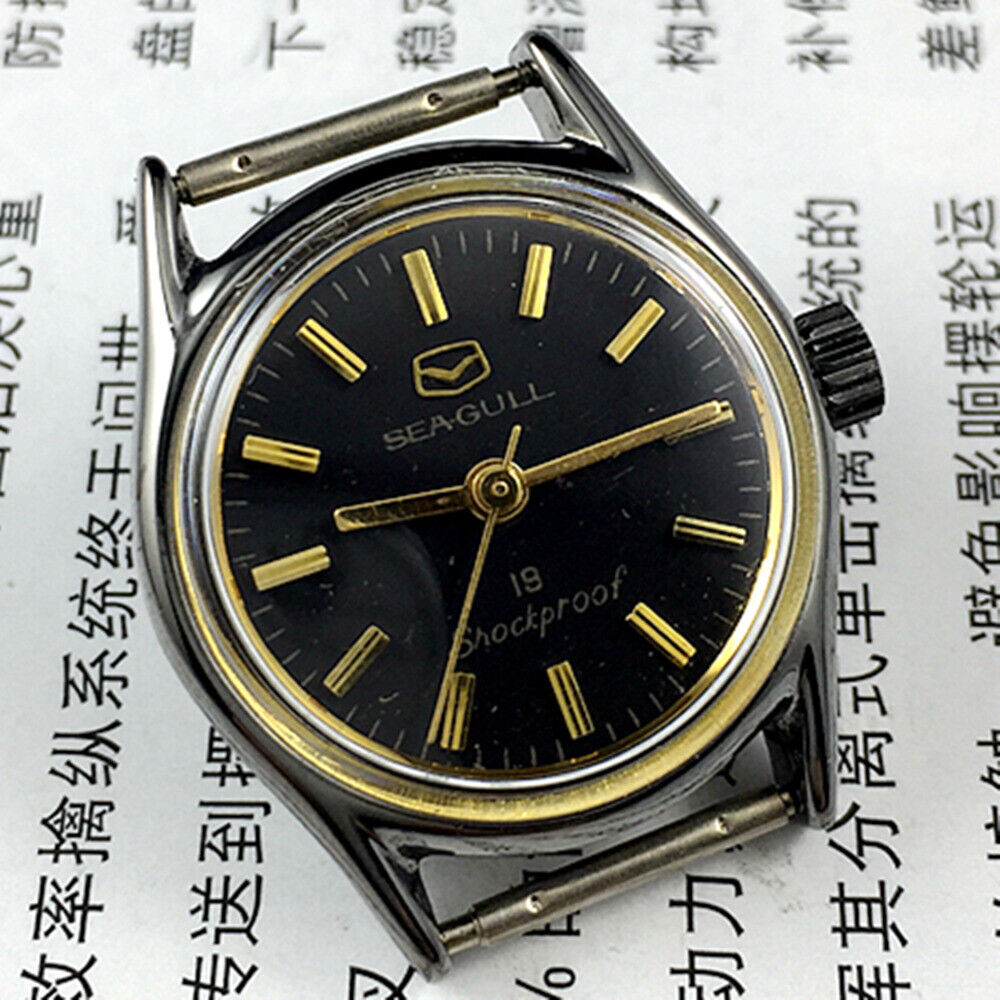 Black case Seagull ladies watch with golden hands, shock-resistant manual mechanical movement.