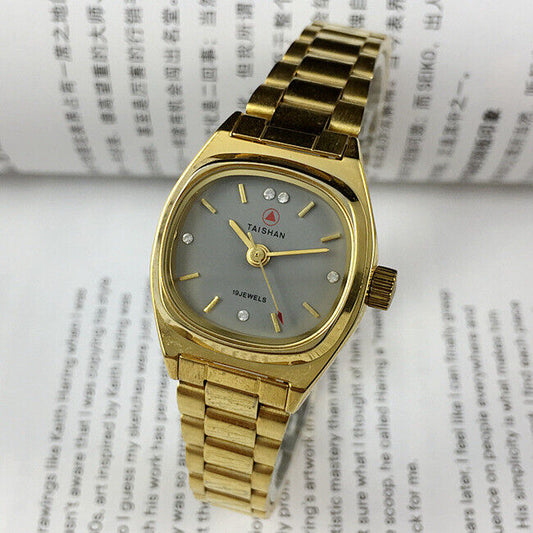 TAISHAN manual mechanical lady watch with 19 jewels, imitation diamond nails, and elegant golden case for stylish wear