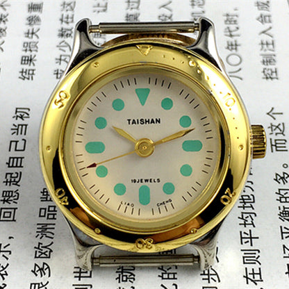 Elegant 28mm TAISHAN lady watch with golden case, numeric markers, manual mechanical movement, and 19 jewels.
