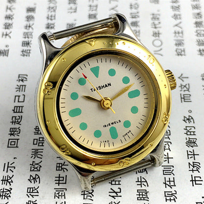 TAISHAN 28mm elegant ladies watch with golden case, numeric markers, manual mechanical movement, and 19 jewels.