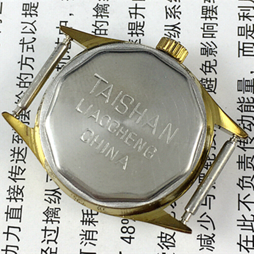 TAISHAN manual mechanical lady watch with 19 jewels, yellow-grey dial, and round golden case for elegant style.
