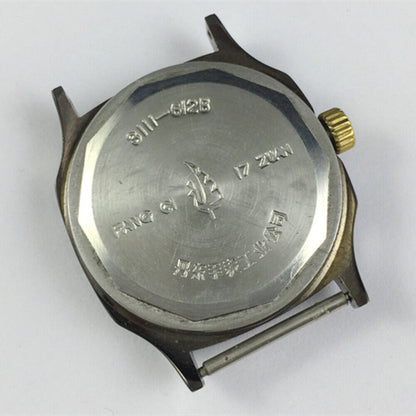 34mm Dandong manual watch with black dial, gold markers, and 19 jewels for precise timekeeping.