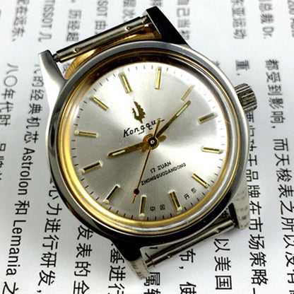 Silver dial 33mm Dandong manual mechanical watch with golden hands, 17 jewels, classic design.