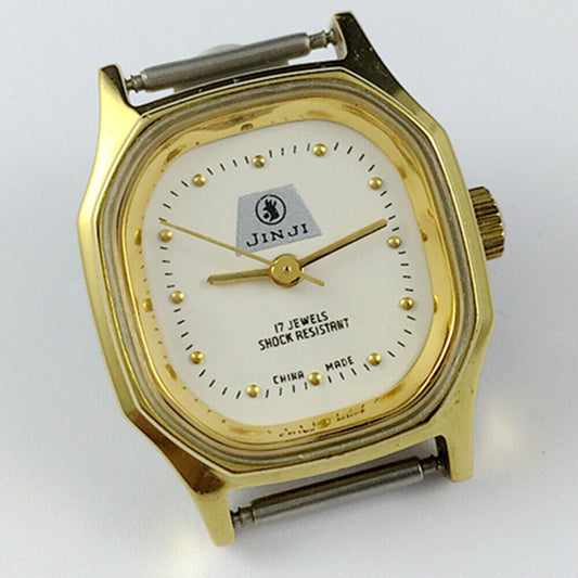 SHANGHAI JINJI 26mm manual mechanical lady watch with golden octagonal case and 17 jewels.