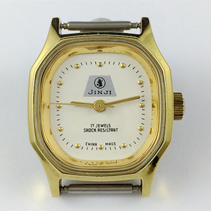SHANGHAI JINJI 26mm lady watch with golden octagonal case, manual mechanical movement, and 17 jewels detail.