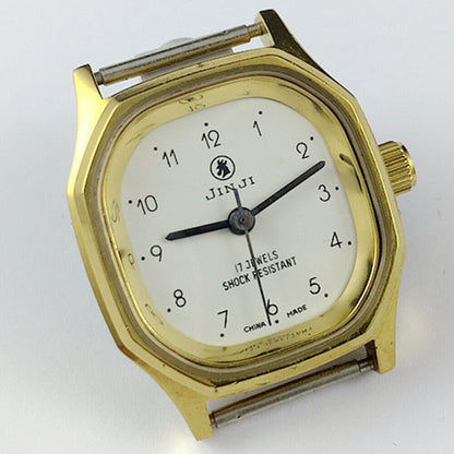 Montre mécanique manuelle SHANGHAI JINJI pour femme, boîtier doré à 17 chiffres, clous