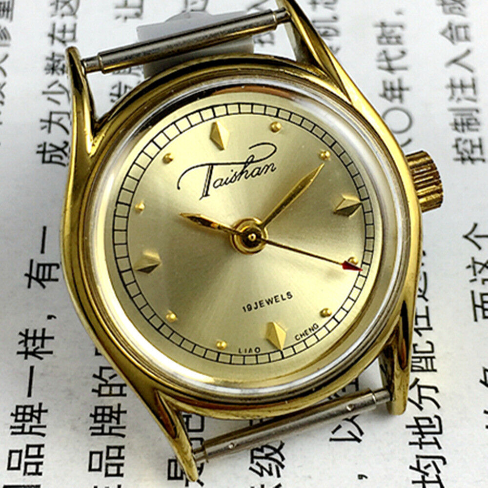 Liaocheng TAISHAN ladies? mechanical watch with golden case and 19 jewels, elegant design for daily wear.