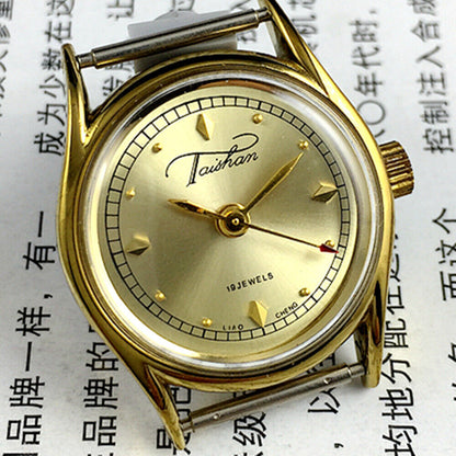 Liaocheng TAISHAN ladies? mechanical watch with golden case and 19 jewels, elegant design for daily wear.