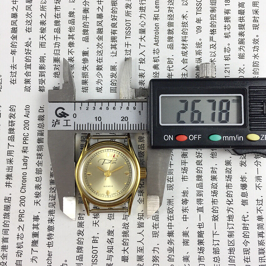 Liaocheng TAISHAN lady watch with golden case, manual mechanical movement, and 19 jewels.