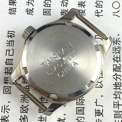 26mm Liaocheng TAISHAN ladies watch with manual mechanical movement and 19 jewels in elegant gold casing.