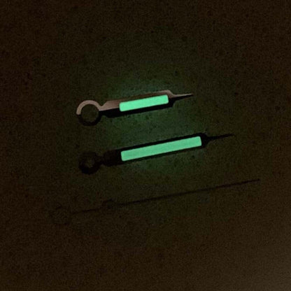 Green luminous watch hands with silver trim for NH35/NH36/4R/7S movements, improving readability and elegance.