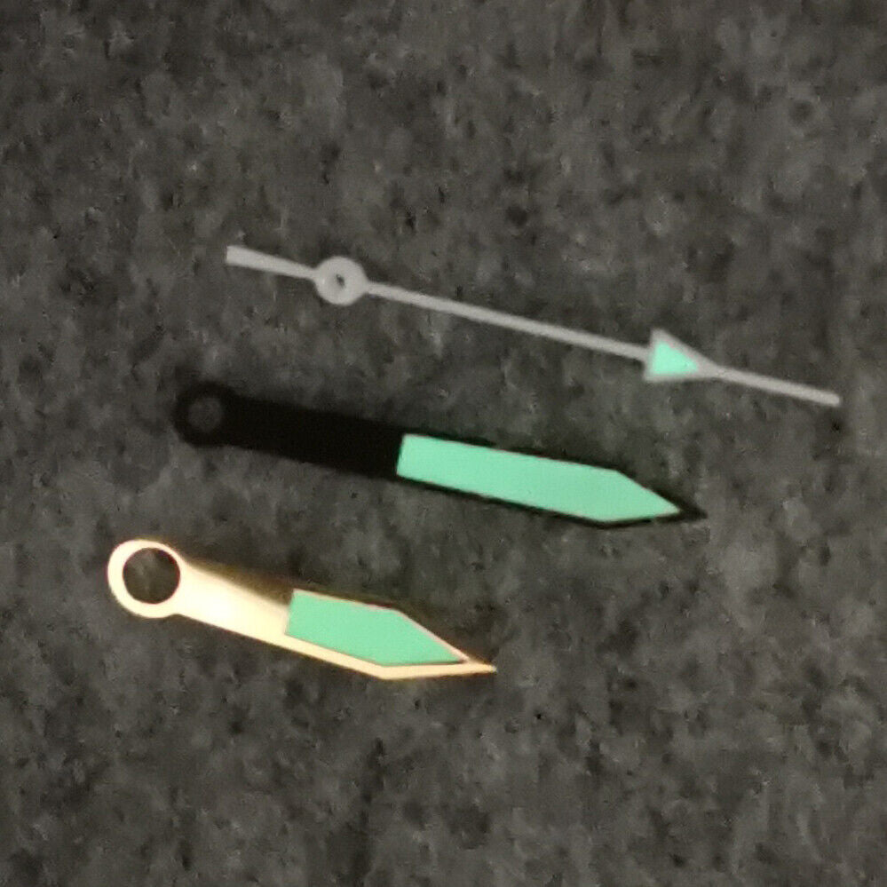 Green luminous golden-trimmed watch hands for NH35/NH36/4R/7S movement, enhancing precision and style.