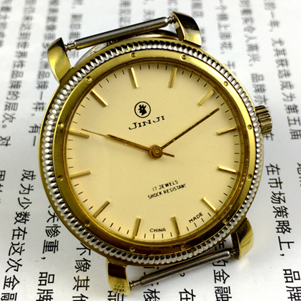 SHANGHAI JINJI 37mm manual mechanical watch with 17 jewels, shock-resistant, gold nail markers, classic style.