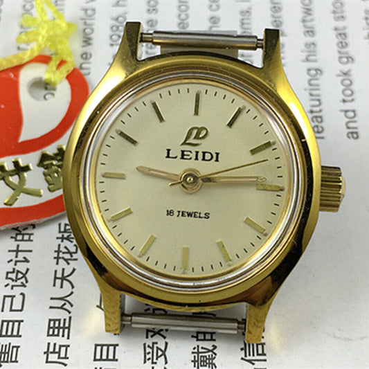 27mm Leidi Steel Lady Watch with golden dial and 18 jewels, paired with matching watch band for elegant style.