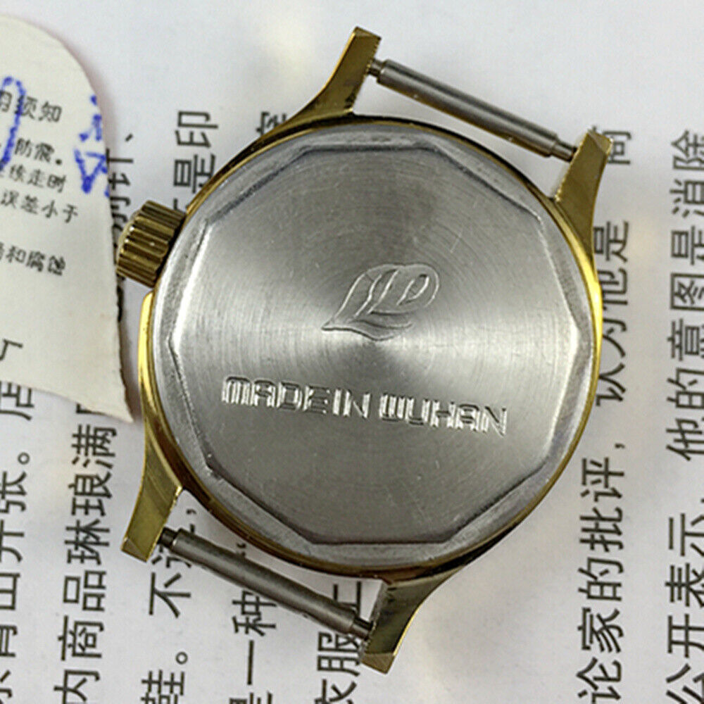 27mm Leidi Steel Lady Watch with golden dial and 18 jewels, paired with matching band for elegant style.