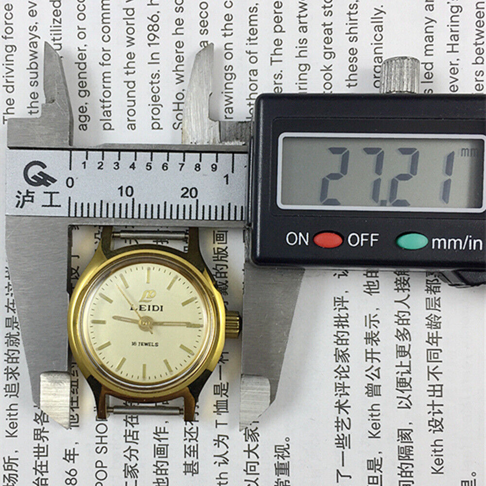 27mm Leidi Steel Lady Watch with golden dial, 18 jewels, and matching band for elegant style by Leidi.
