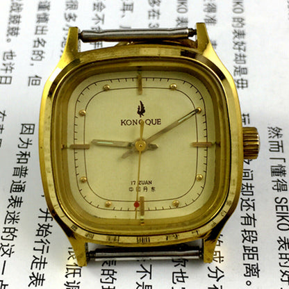 33mm Kongque steel manual mechanical watch with 17 jewels, golden dial, and matching steel band for elegant wear.
