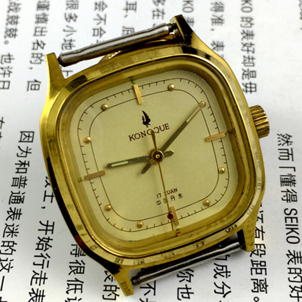 33mm Kongque steel manual watch with 17 jewels, golden dial, and steel band for elegant style.