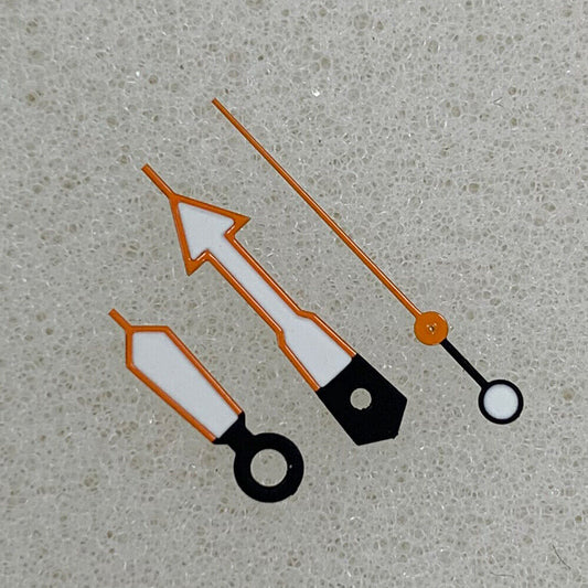 Arrow-shaped orange trim watch hands with green luminous fill for NH35/NH36/4R/7S movements, enhancing visibility and style.
