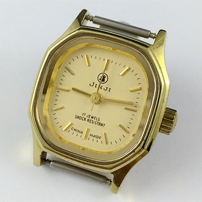 SHANGHAI JINJI 26mm lady watch with golden square case and 17-jewel manual mechanical movement.
