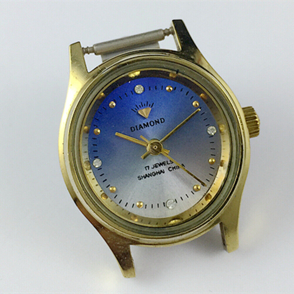 25mm Shanghai Diamond Oval lady watch with blue dial, 17 jewels, manual mechanical movement.