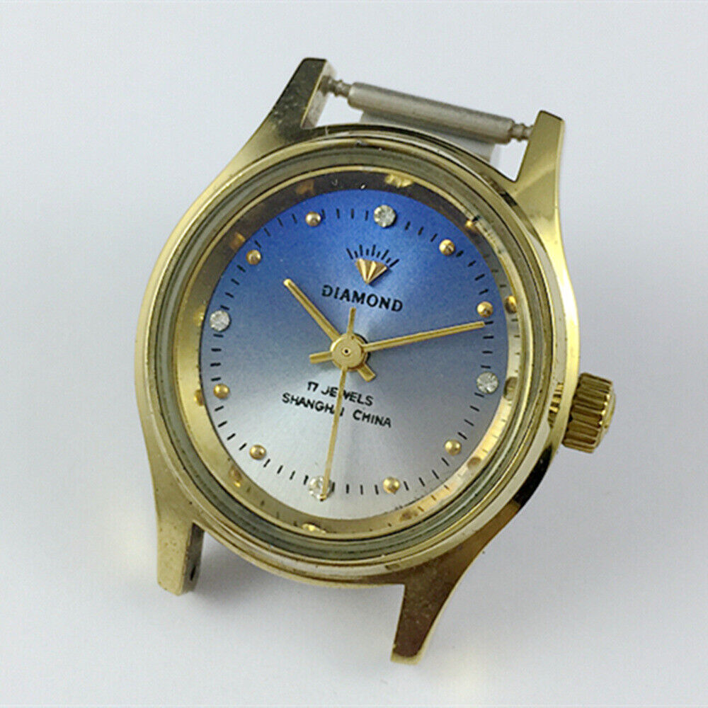 Shanghai Diamond 25mm oval lady watch with blue dial, 17 jewels, manual mechanical movement.