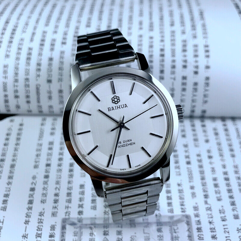 China Baihua 37mm manual mechanical watch with silver dial, 19 jewels, shock-resistant for lasting precision.