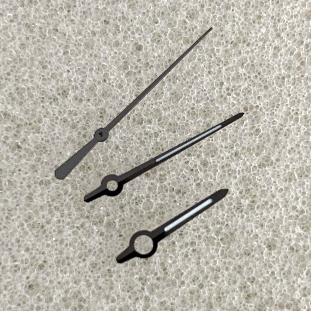 Green luminous watch hands with black trim for NH35/NH36/4R/7S movements, enhancing readability and style by BrandName.
