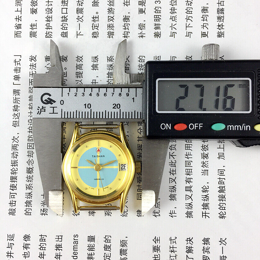 TAISHAN 26mm gold lady watch with manual mechanical movement, single calendar, and 19-jewel mechanism