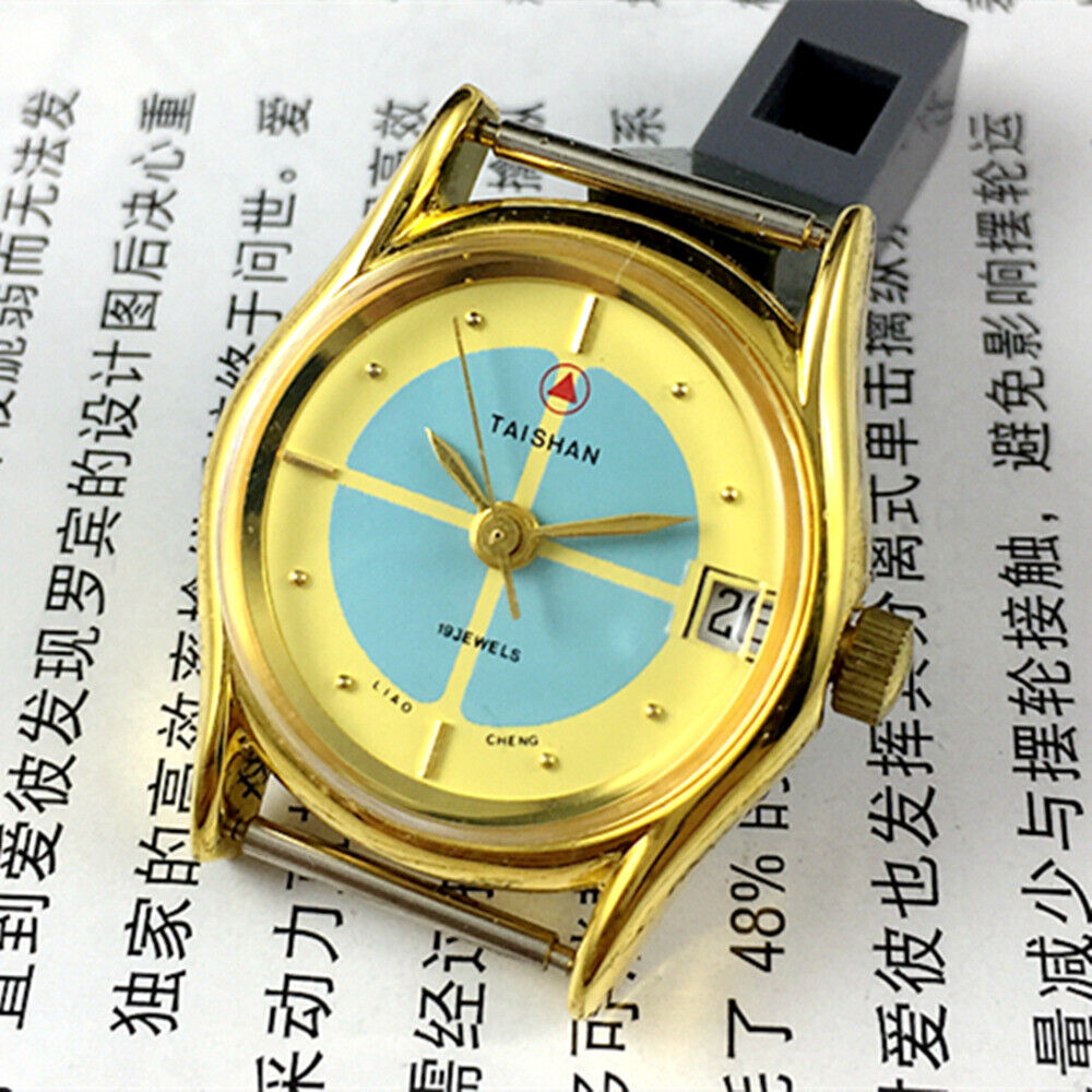 TAISHAN 26mm gold manual mechanical lady watch featuring single calendar and 19 jewels mechanism for elegant timekeeping.