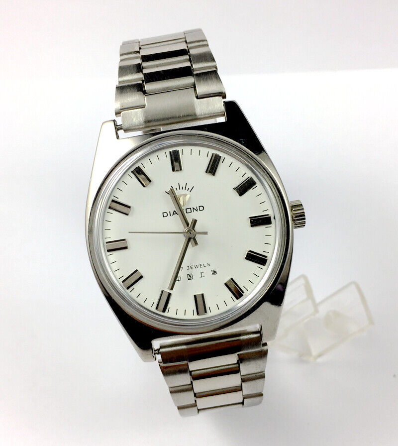 SHANGHAI DIAMOND 38mm manual mechanical watch with 17 jewels, white dial, and silver case for classic style.