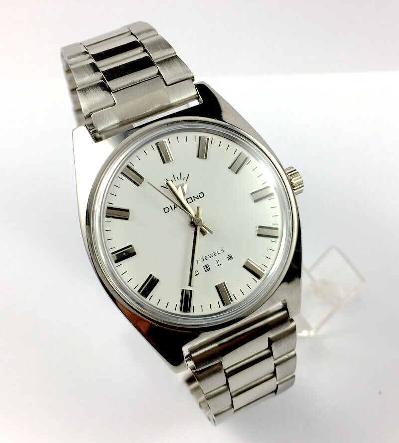 SHANGHAI DIAMOND 38mm manual mechanical watch with white dial and silver case, classic elegance for every occasion.