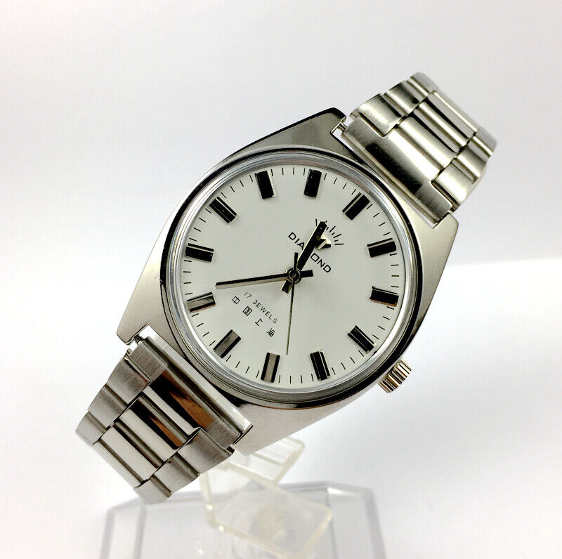 SHANGHAI DIAMOND 38mm manual watch with white dial, silver case, and 17 jewels for classic elegance.