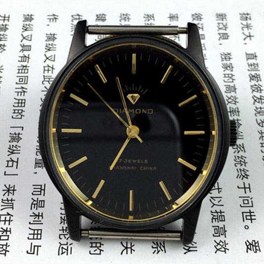 36mm SHANGHAI DIAMOND oval manual watch with 17 jewels, black dial and sleek black case for elegant style.