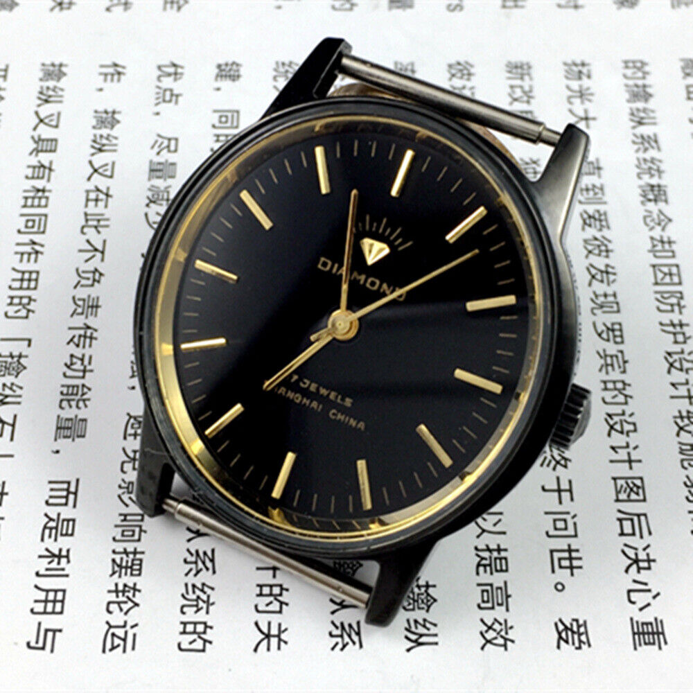 36mm SHANGHAI DIAMOND oval manual watch with 17 jewels, black dial and sleek black case for elegant style.