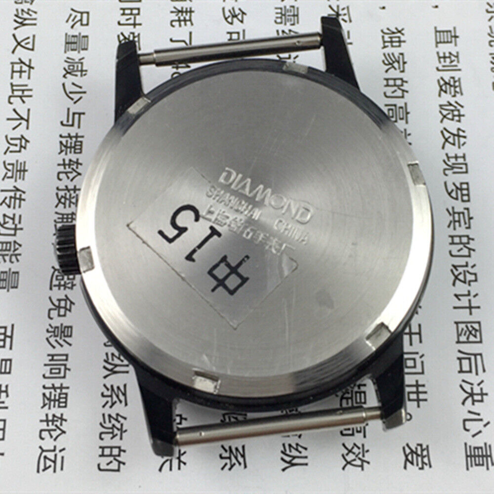 36mm SHANGHAI DIAMOND 17-jewel oval manual watch with black dial and sleek case for refined elegance.