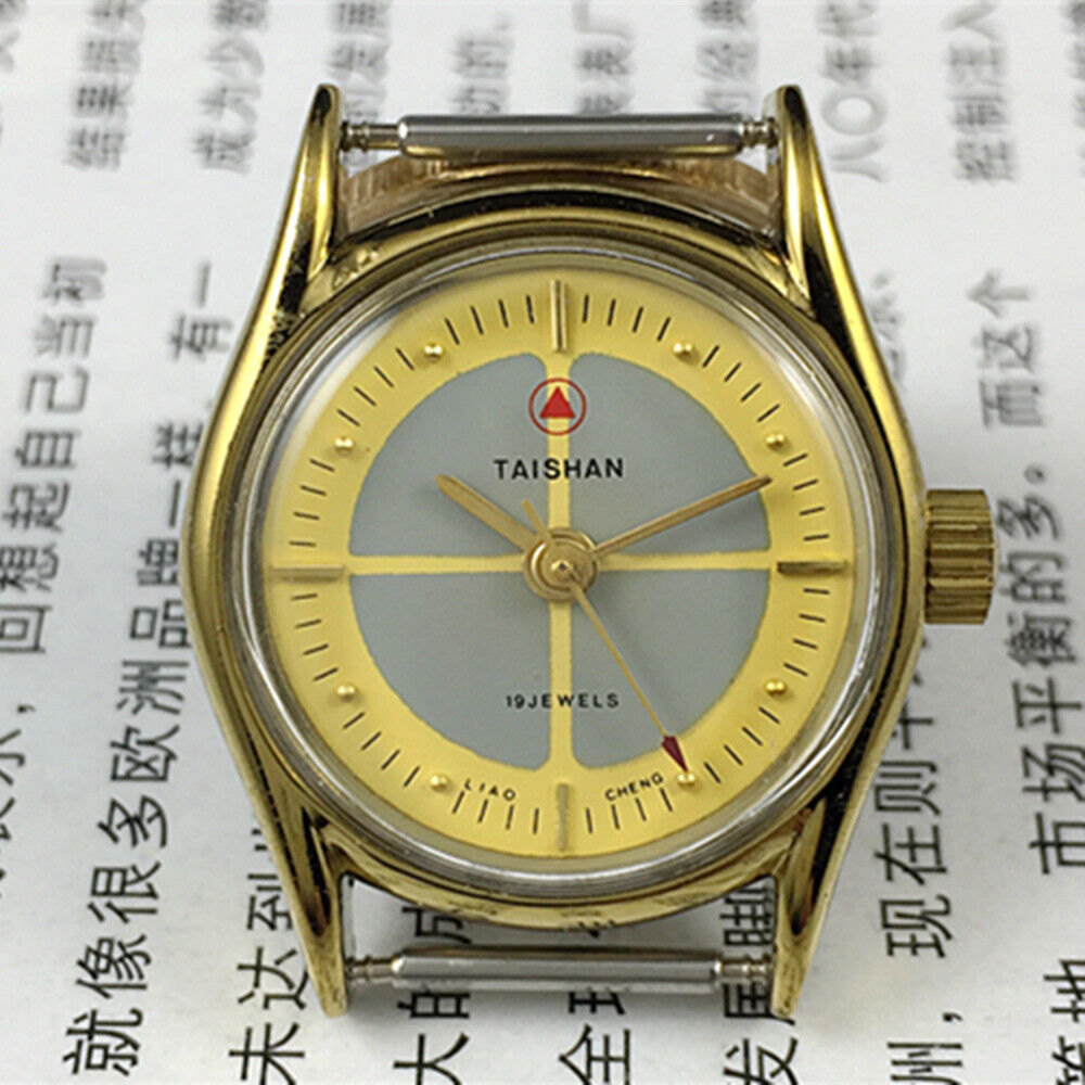 Elegant 27mm Liaocheng TAISHAN manual mechanical lady watch with golden nails, 19 jewels, and 3 hands for precise timekeeping.