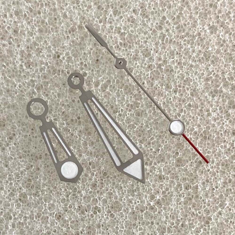 Green luminous silver trim hollow watch hands designed for NH35/NH36/4R/7S movements.