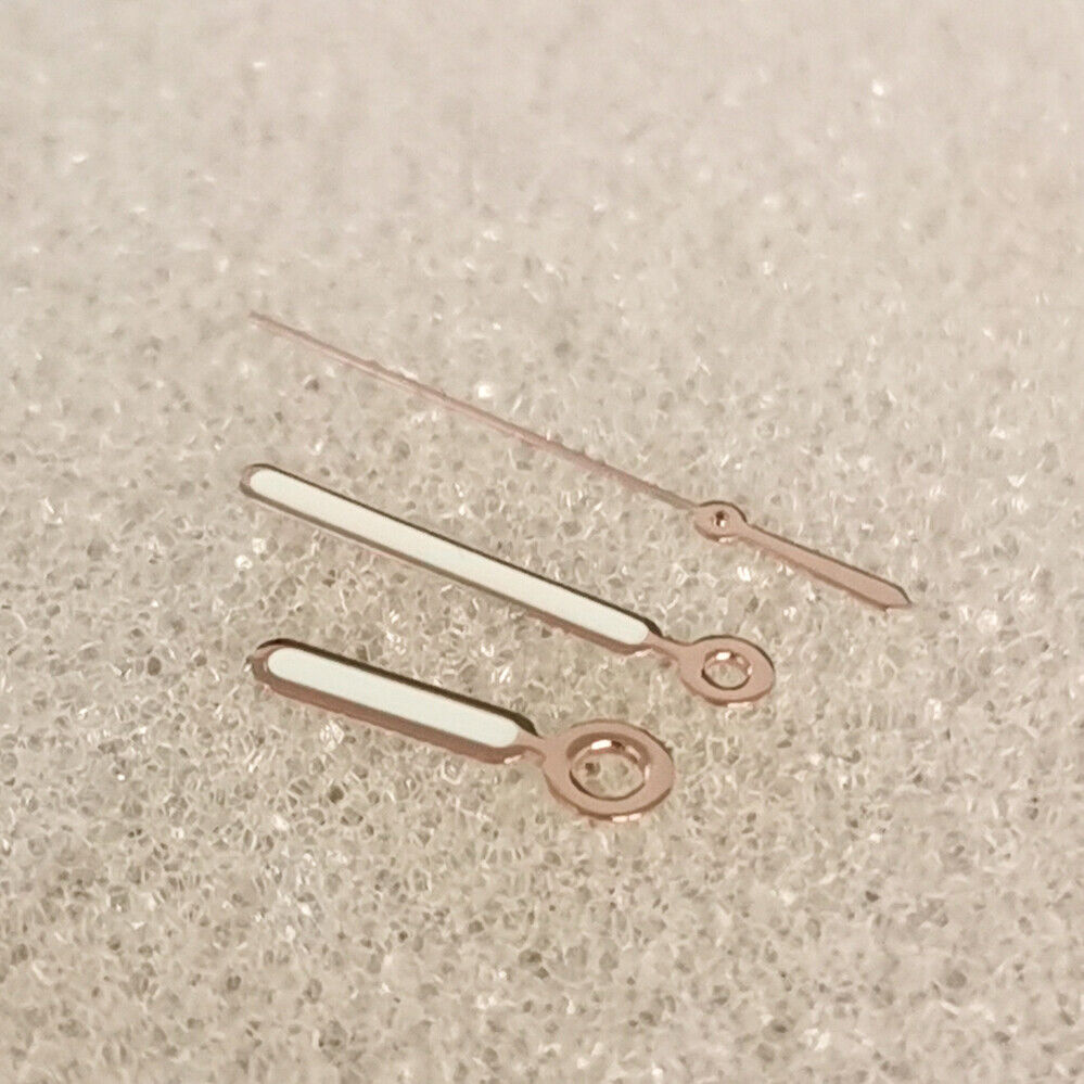 Green luminous rose gold watch hands with trim, compatible with NH35/NH36/4R/7S movements.