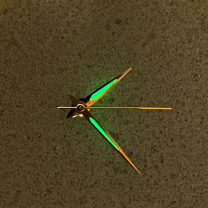 Silver arrow-shaped luminous watch hands with green glow for NH35/NH36 movement, enhancing visibility and style.