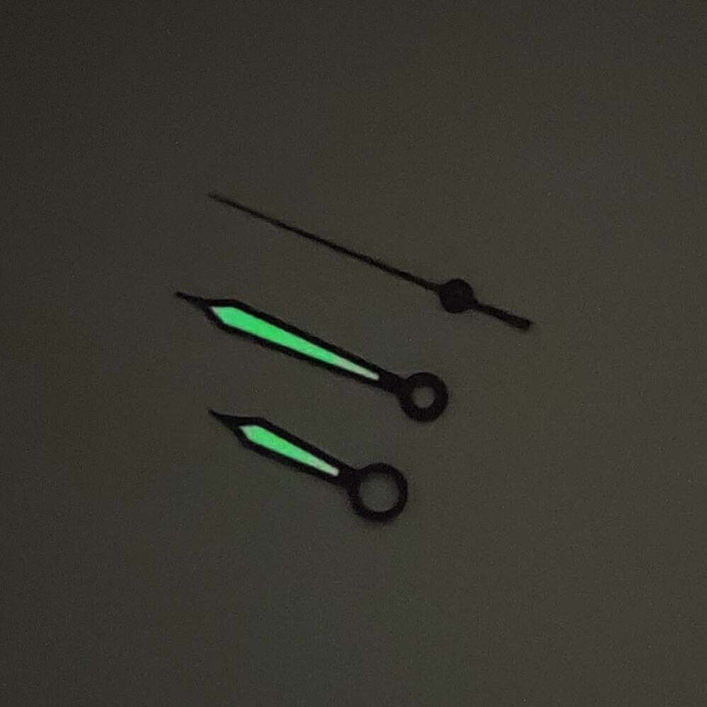 Green luminous watch hands with black trim for Seiko NH35/NH36/4R/7S movements, perfect for replacements.