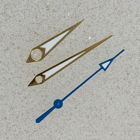 Golden arrow-shaped luminous watch hands with green trim, compatible with NH35/NH36/4R/7S movements.