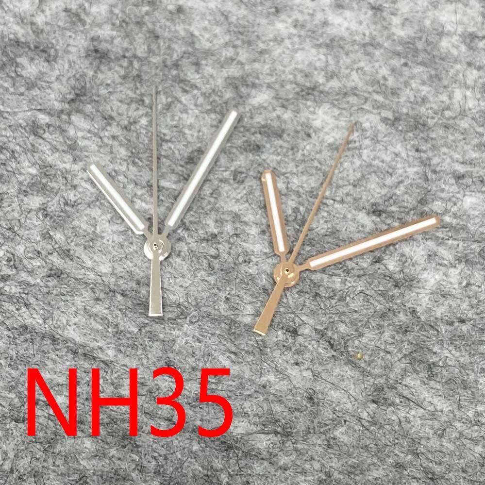 Green luminous watch hands with silver and gold trim for NH35/NH36/4R36 movements, enhancing readability and style.